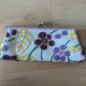 Nicole Lee clutch purse. Purple flowers.